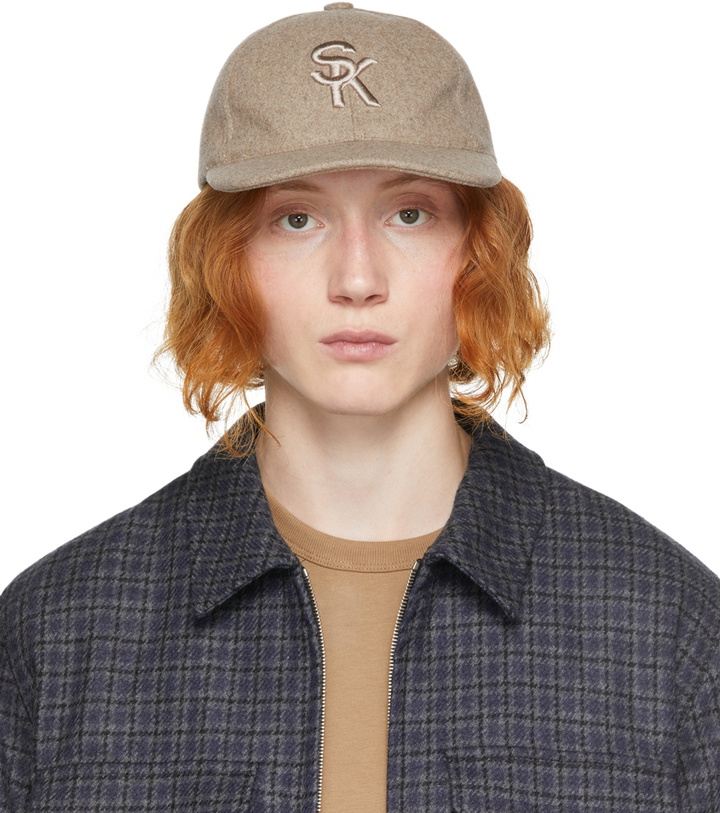 Photo: A.P.C. Beige Suzanne Koller Edition Cap