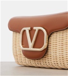 Valentino Garavani Locò Small woven leather-trimmed shoulder bag