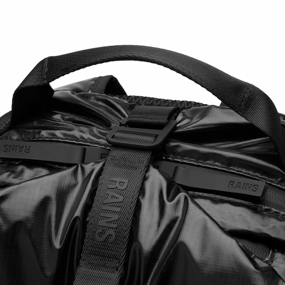 RAINS Sibu Clip Front Backpack in Black 