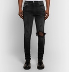 AMIRI - Skinny-Fit Distressed Stretch-Denim Jeans - Men - Black