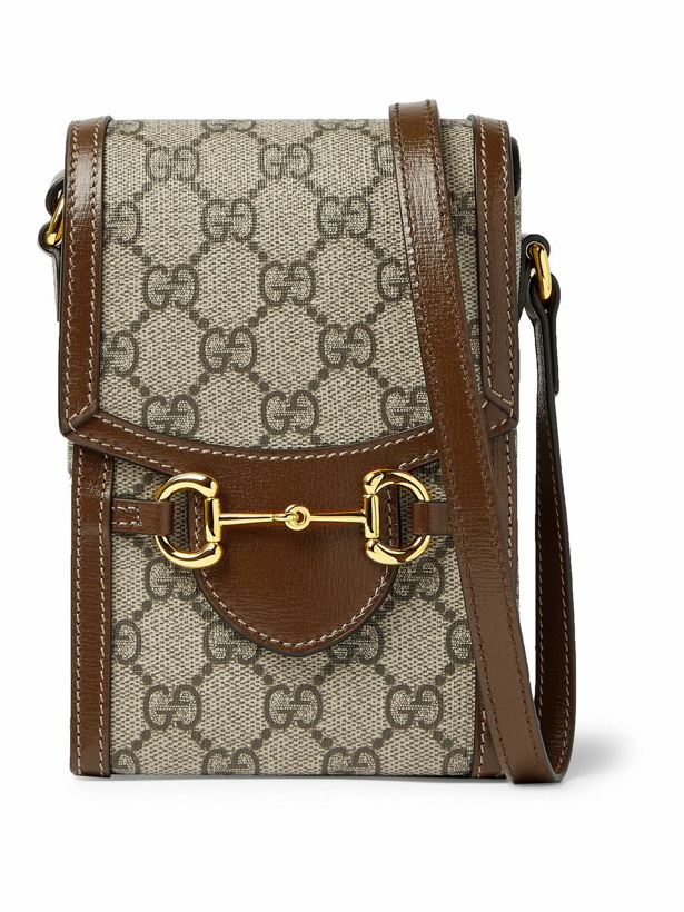 Photo: GUCCI - Horsebit Leather-Trimmed Monogrammed Coated-Canvas Pouch