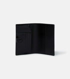 Gucci - GG embossed passport holder