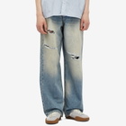 Nahmias Men's Distressed Baggy Jeans in Light Wash