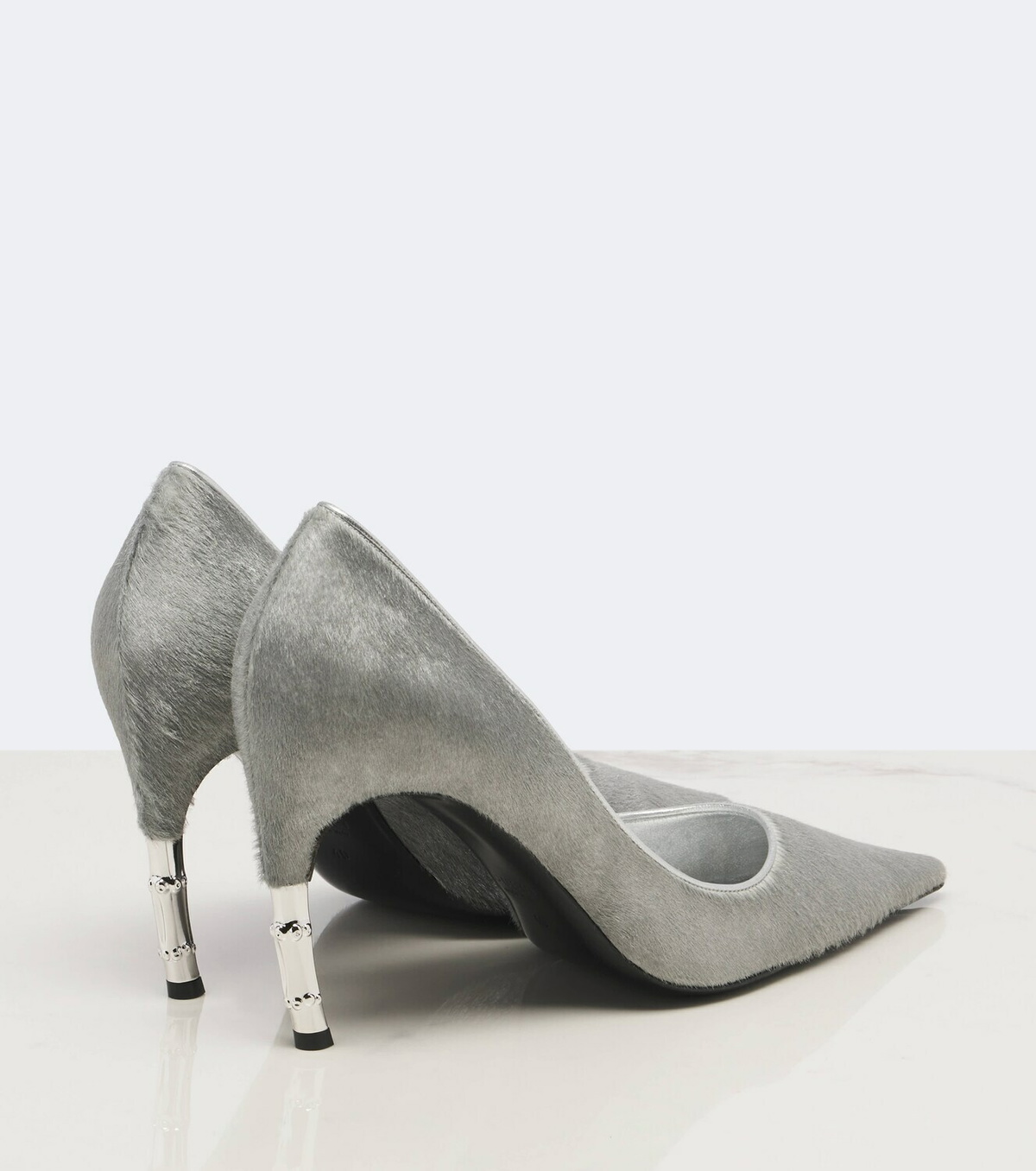 Gucci Castello calf hair pumps