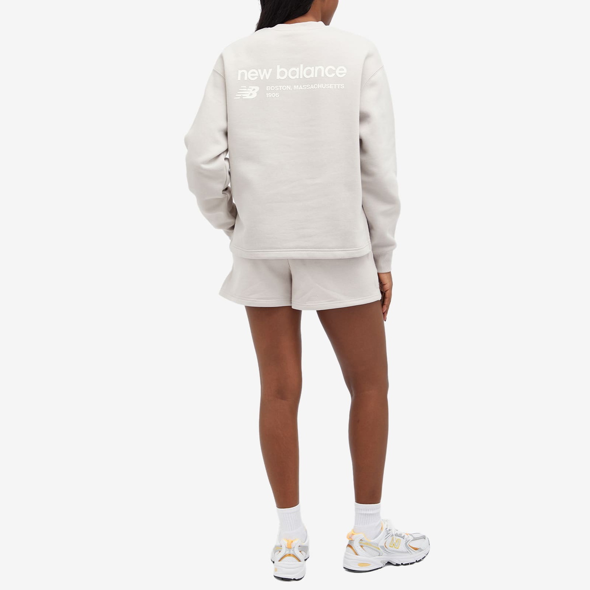 New Balance Women's Linear Heritage Brushed Back Fleece Crewneck in Moonrock