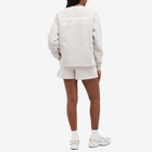 New Balance Women's Linear Heritage Brushed Back Fleece Crewneck in Moonrock