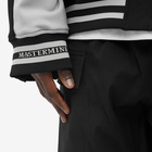 MASTERMIND WORLD Men's Varsity Jacket in Black C Grey