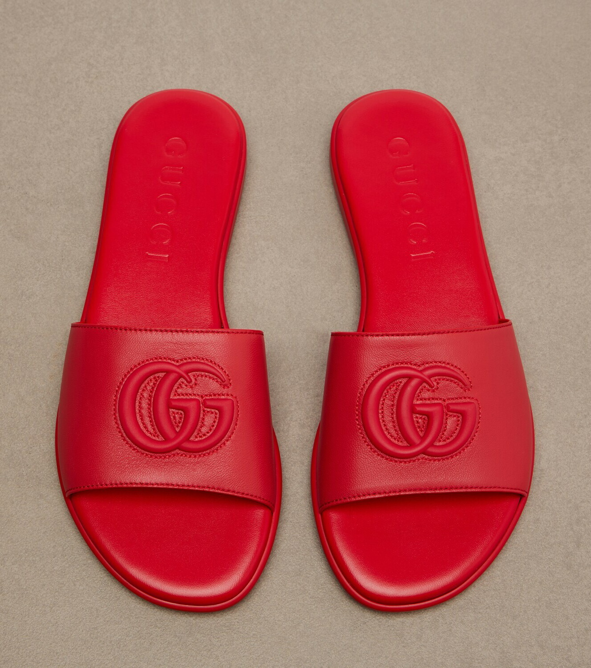 Gucci Double G leather slides
