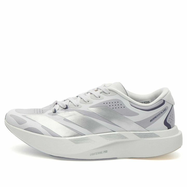 Photo: Adidas Women's Adizero Evo Sl Exo Sneaker in Glory Grey/Silver Met./Dash Grey