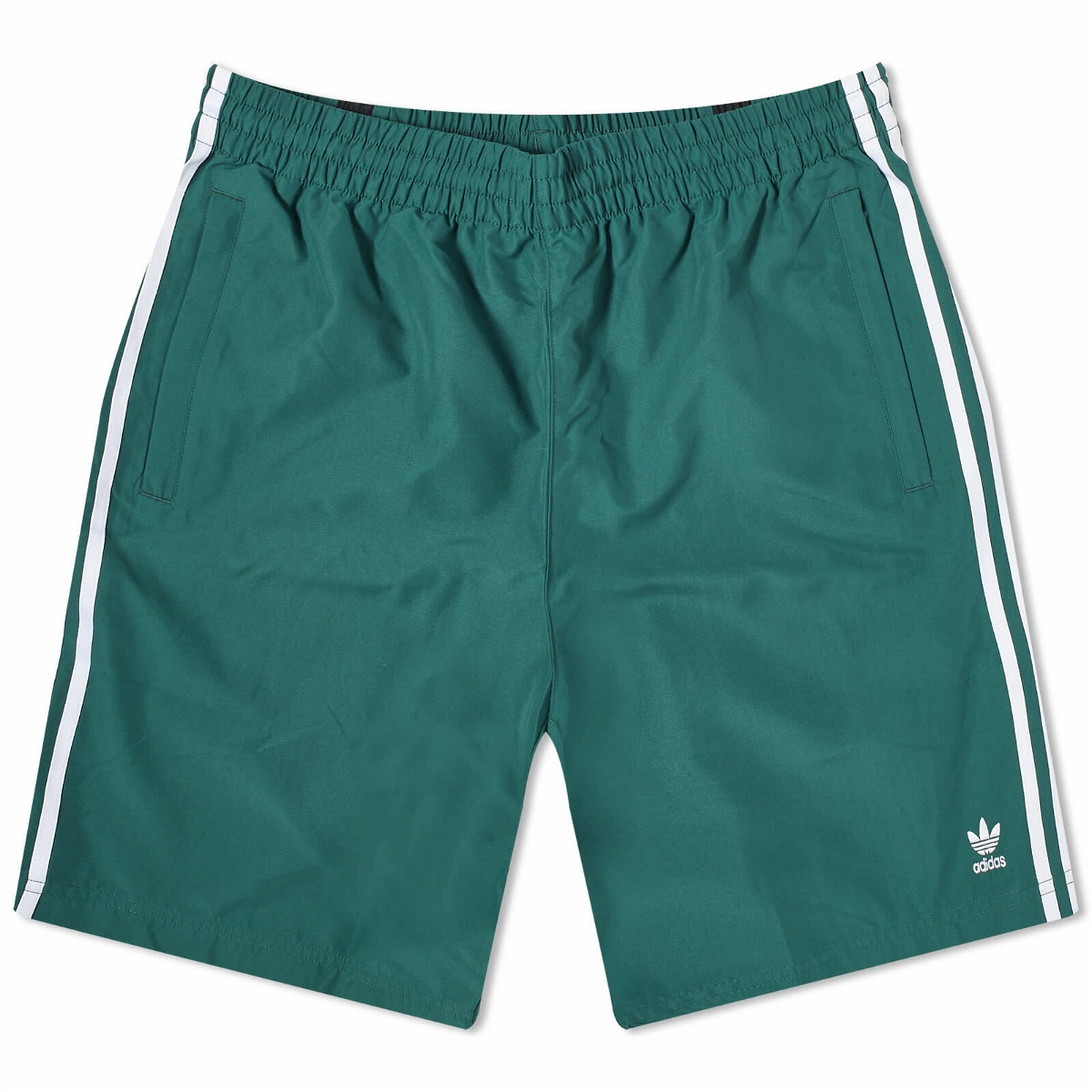 Photo: Adidas Oversized Retro Shorts in Collegiate Green