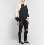 AMIRI - Skinny-Fit Appliquéd Paint-Splattered Distressed Stretch-Denim Jeans - Black