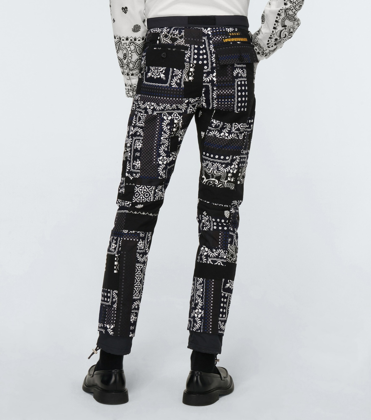 Sacai - Hank Willis Thomas Archive printed Mix pants