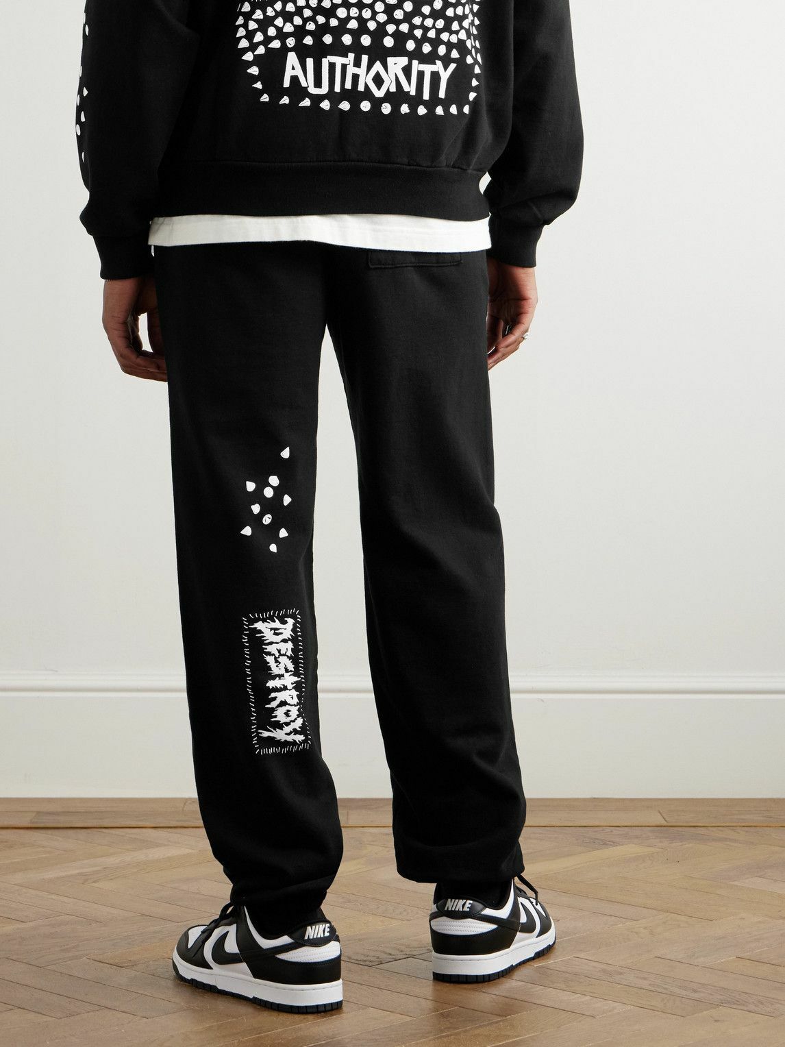 Local Authority LA - Stud Skull O Tapered Logo-Print Cotton-Jersey Sweatpants - Black
