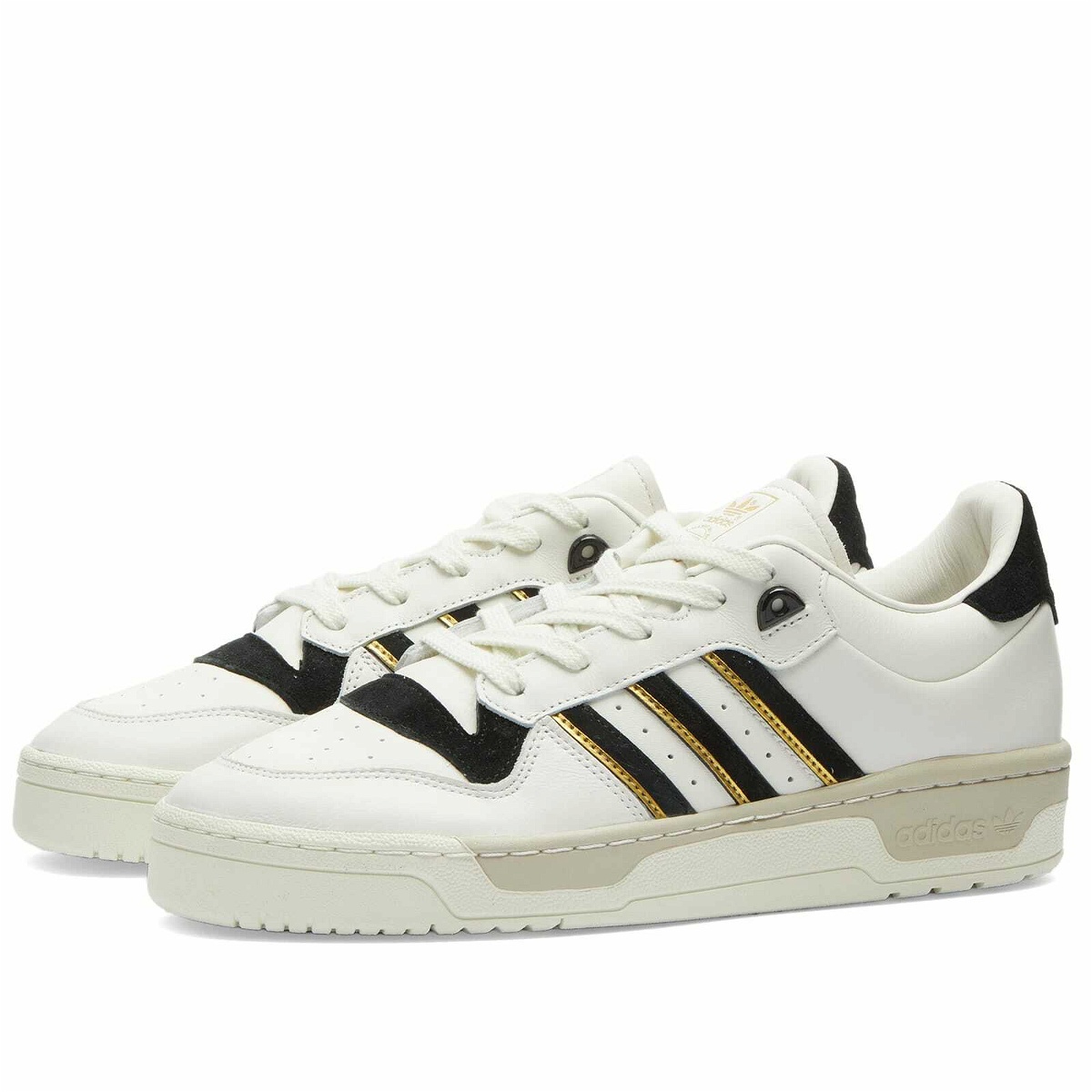 Photo: Adidas Men's RIVALRY 86 LOW Sneakers in Cloud White/Core Black/Ivory