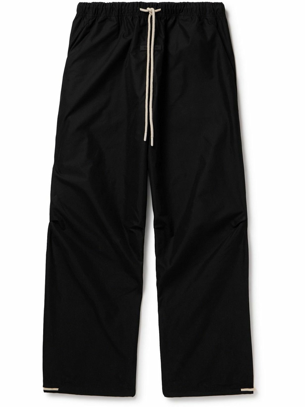 Photo: FEAR OF GOD ESSENTIALS - Wide-Leg Logo-Appliquéd Cotton-Blend Drawstring Trousers - Black