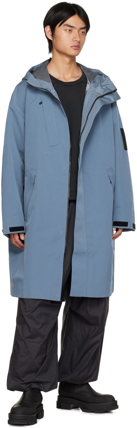A. A. Spectrum Blue Flowted Rain Coat