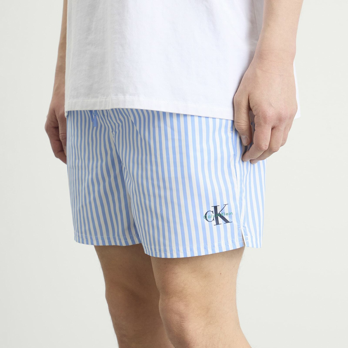 Calvin Klein Men's Medium Drawstring Swim Shorts in Penny Stripe/Blue Descent