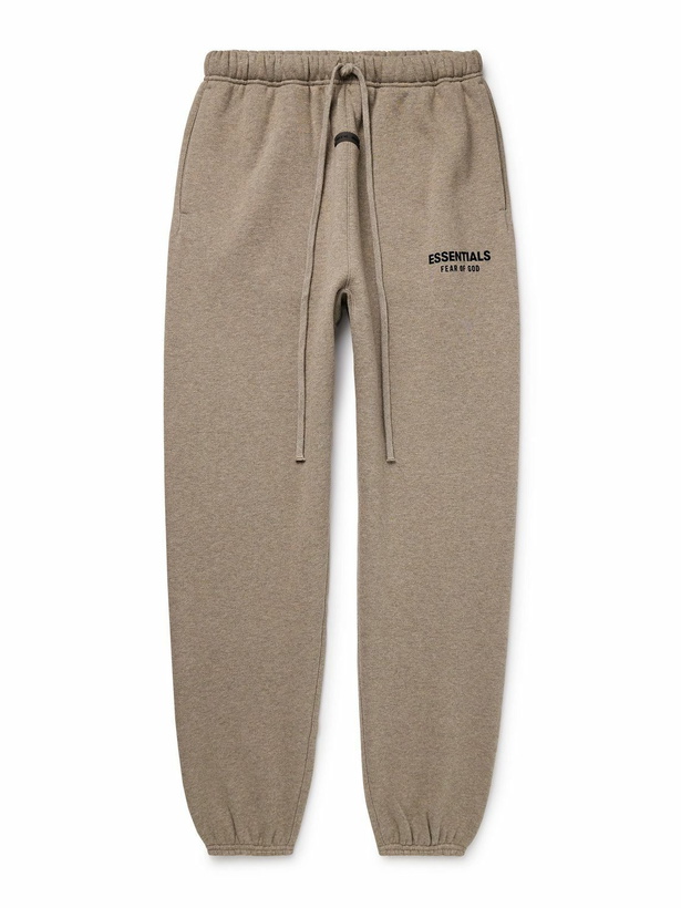 Photo: FEAR OF GOD ESSENTIALS - Tapered Logo-Appliquéd Cotton-Blend Jersey Sweatpants - Brown