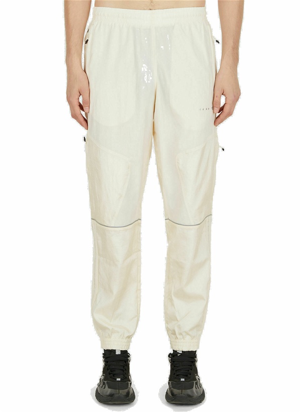Photo: Material Mix Track Pants in Cream