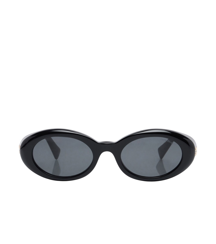 Photo: Miu Miu Rêverie oval sunglasses