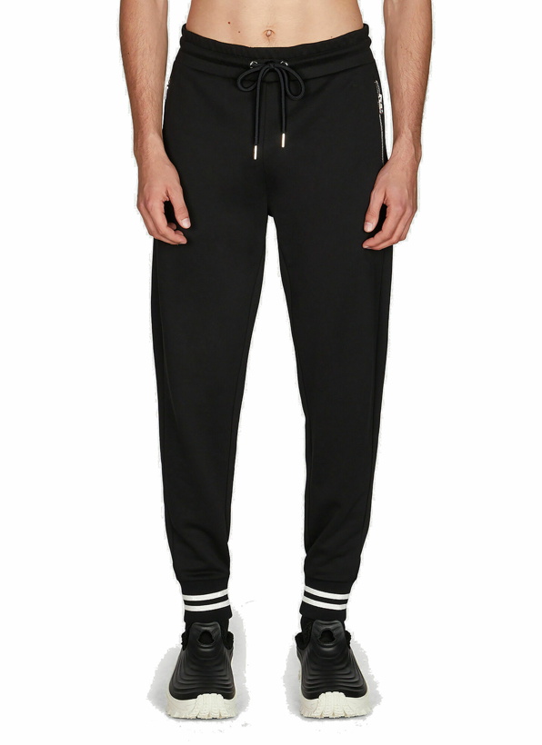 Photo: Tapered Track Pants in Black