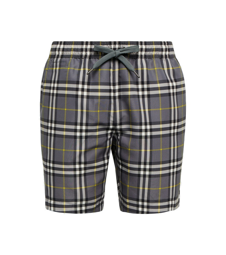 Photo: Burberry - Checked swim trunks