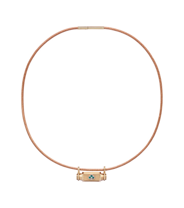 Photo: Marie Lichtenberg Clover Smash 18kt gold and leather locket necklace with emeralds