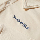 Sporty & Rich Long Sleeve Classic Logo Polo Shirt in Cream/Navy