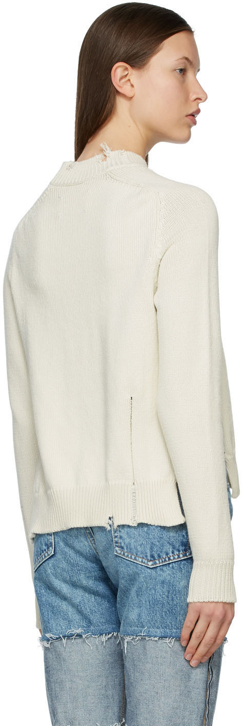 White shop destroyed sweater