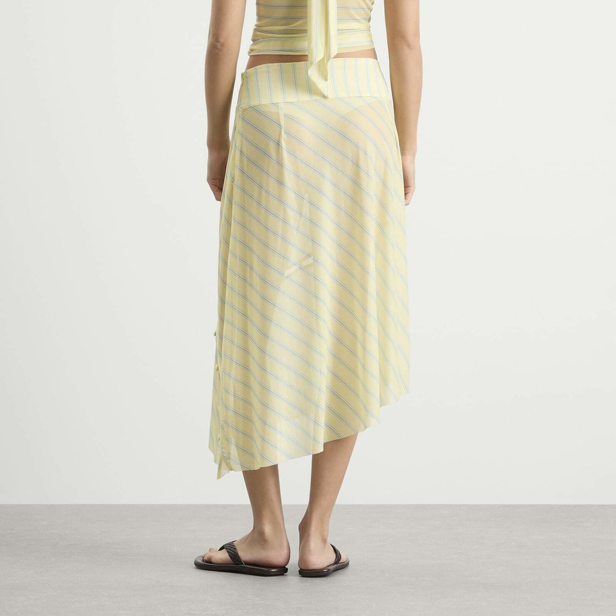 House Of Sunny Women's Striped Mesh Asymmetric Skirt in Butter
