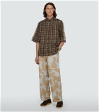 Undercover - Wide-leg camouflage pants
