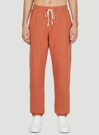 Champion - Logo Embroidery Track Pants in Orange