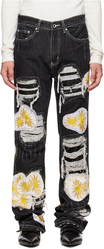 Photo: Who Decides War by MRDR BRVDO SSENSE Exclusive Black Distressed Daisy Jeans