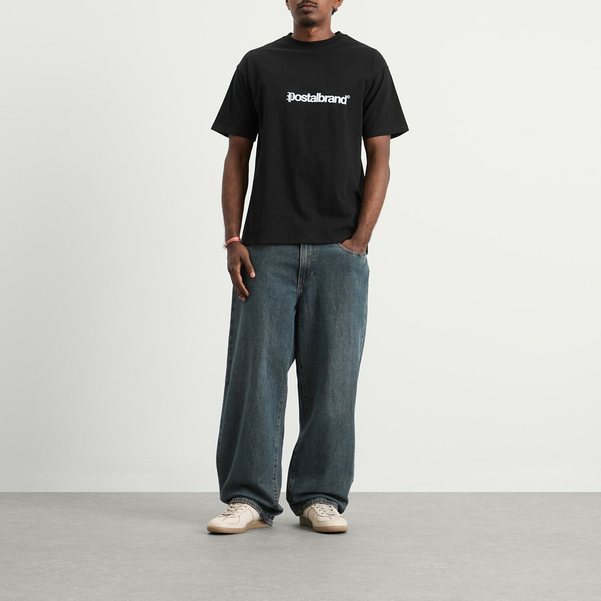 POSTAL Men's Headline T-Shirt in Black