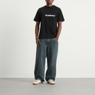 POSTAL Men's Headline T-Shirt in Black