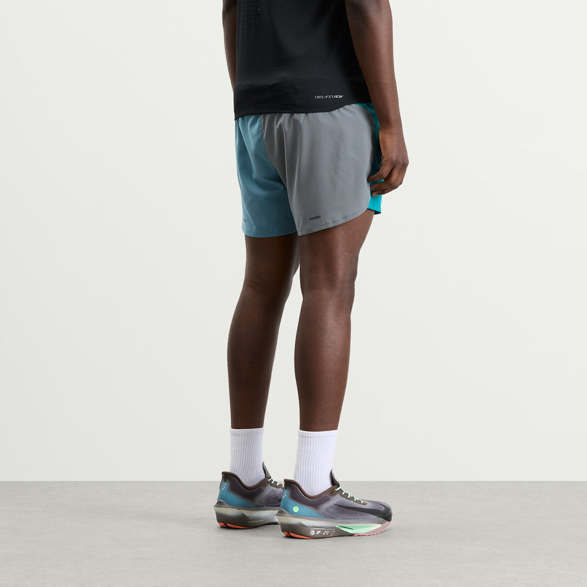 Nike Men's Stride Short in Bright Spruce