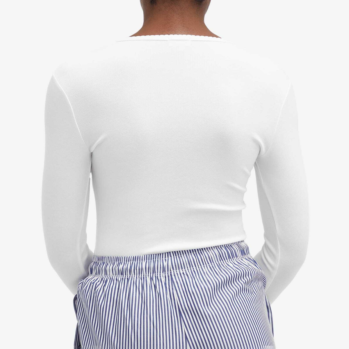 DONNI. Women's Baby Rib Scallop Long Sleeve Top in Powder