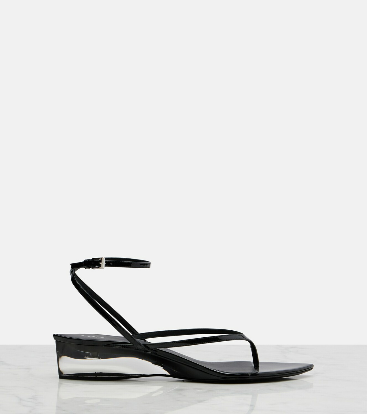 Alaïa Invisible patent leather thong sandals