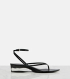 Alaïa Invisible patent leather thong sandals