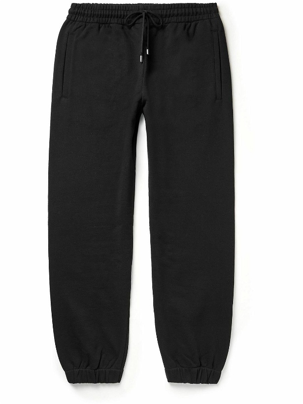 Photo: GUCCI - Tapered Logo-Print Cotton-Jersey Sweatpants - Black