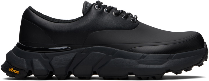 Photo: Comme des Garçons Homme Black Synthetic Leather Low Top Sneakers