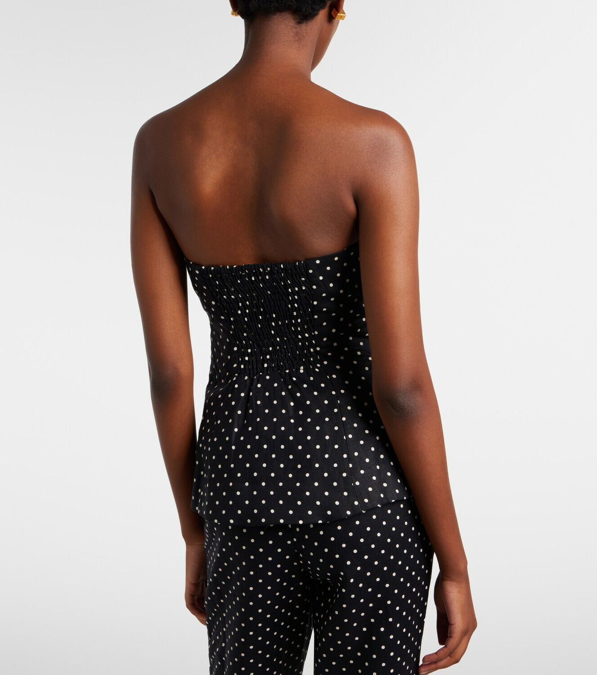 Faithfull Petro polka-dot peplum linen top