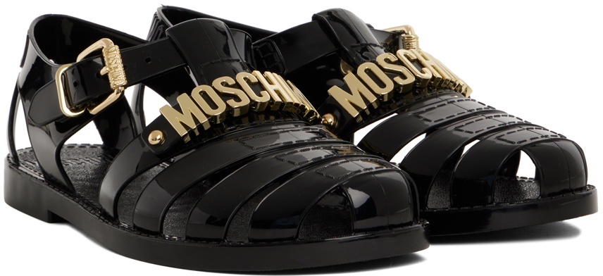 サンダル・ミュール MOSCHINO Women Sandals MA16244G1GMU0000 Black Moschino Buckle Leather Platform Sandals | Saks Fifth Avenue