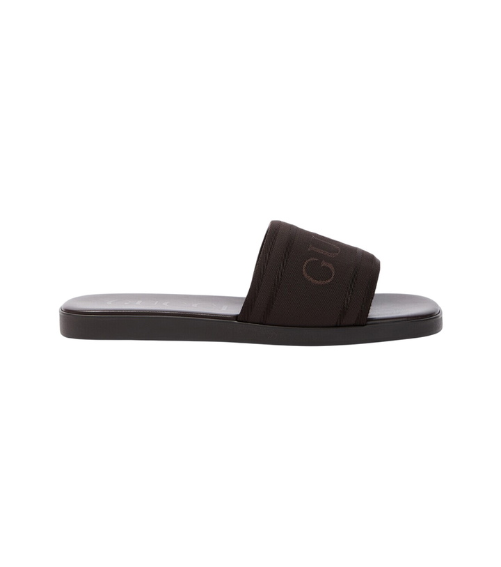 Photo: Gucci Logo canvas and leather slides
