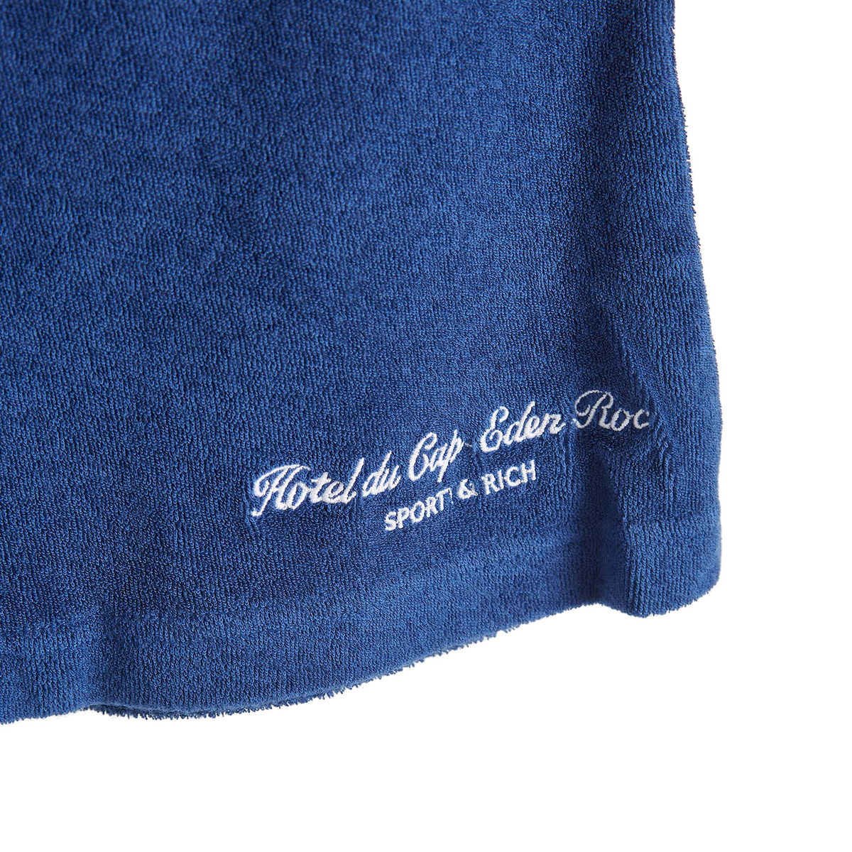 Sporty & Rich Hotel du Cap Cursive Terry Short in Indigo White