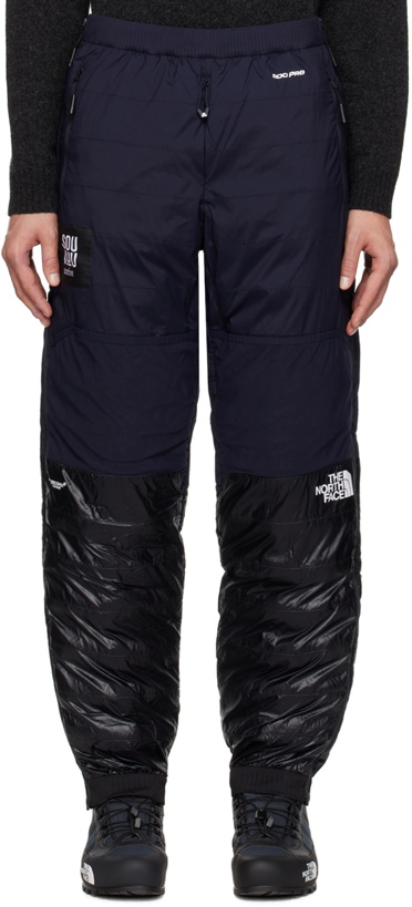 Photo: UNDERCOVER Navy & Black The North Face Edition Down Trousers