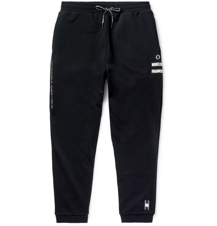 Photo: Moncler Genius - 7 Moncler Fragment Slim-Fit Tapered Appliquéd Printed Loopback Cotton-Jersey Sweatpants - Black