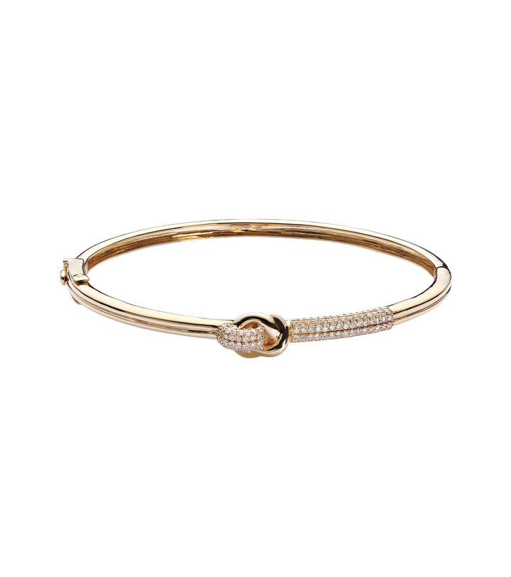 Photo: Stone and Strand 14kt gold bangle with diamond
