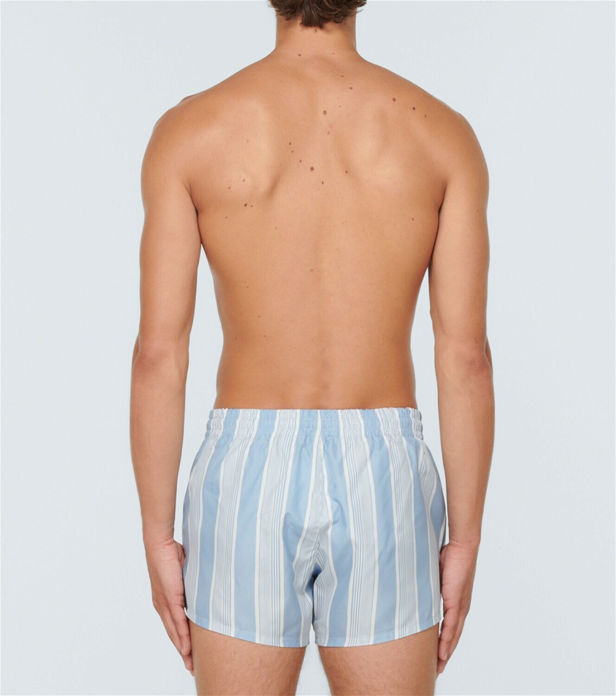 Commas Striped swim trunks
