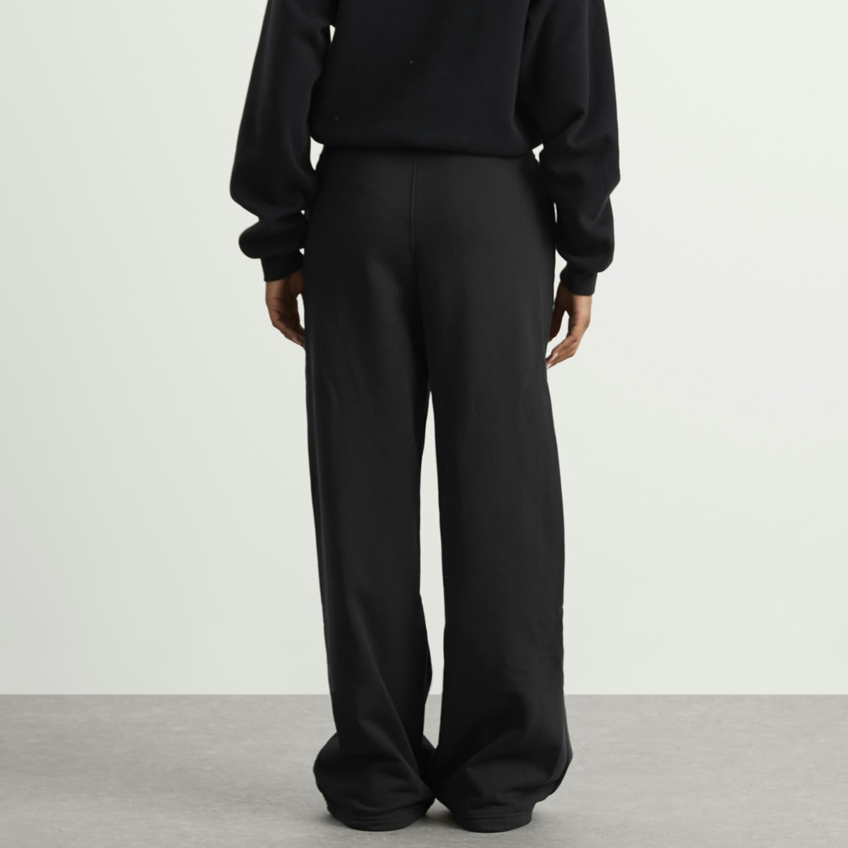 Air Jordan Women's Flight Fleece Open Hem Pant in Black/Smoke Grey